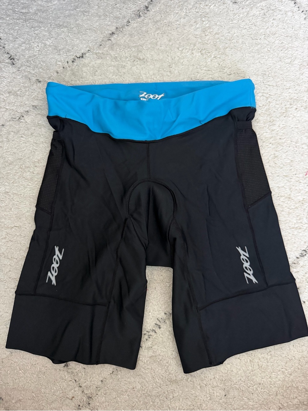Zoot Women’s Black Swim Tri Shorts with Blue Waistband